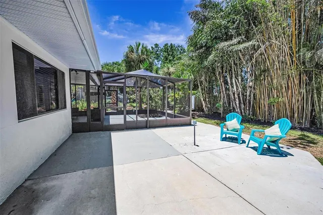 a backyard of a house with lots of green space