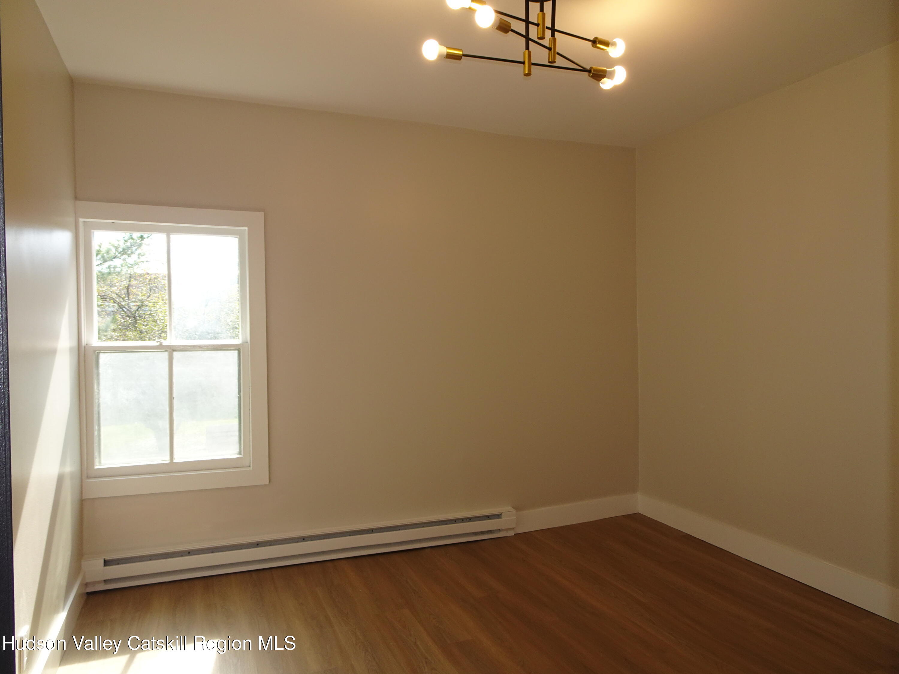 167 Highway 23, Unit 4C Claverack, NY 12513 - Photo 15 of 25 an empty room with a window