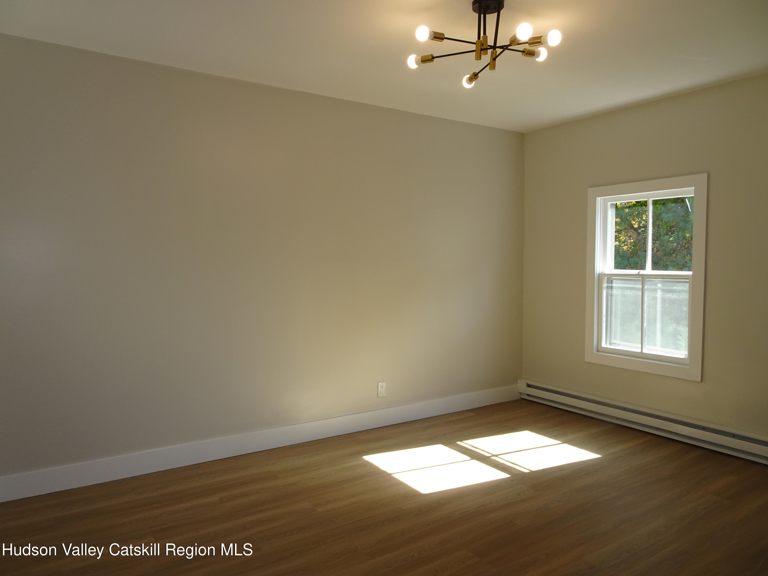 167 Highway 23, Unit 4C Claverack, NY 12513 - Photo 16 of 25 an empty room with a window