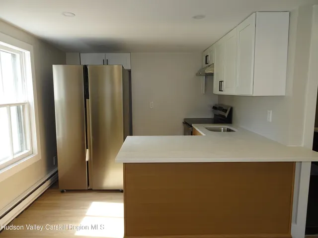 a room with a bed and a window