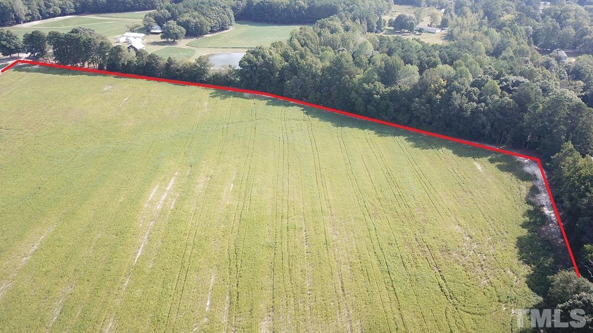 47.52-acres Pilot-Riley Road Zebulon, NC 27597 - Photo 13 of 22 a close up of a swimming pool with a yard