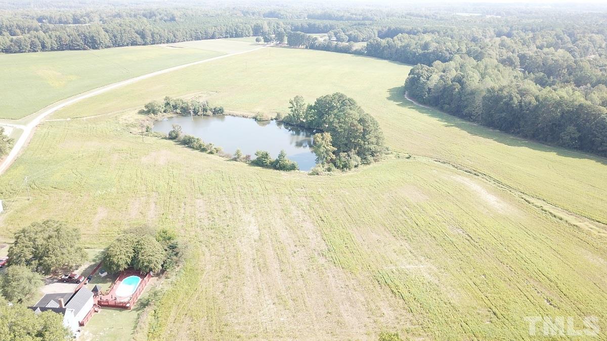 47.52-acres Pilot-Riley Road Zebulon, NC 27597 - Photo 18 of 22 a view of a swimming pool and an outdoor space
