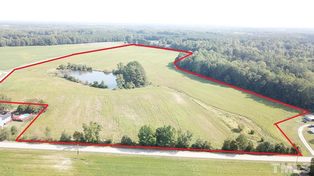 47.52-acres Pilot-Riley Road Zebulon, NC 27597 - Photo 19 of 22 a view of a swimming pool with an ocean view