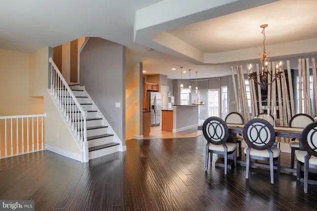 a view of a room and wooden floor