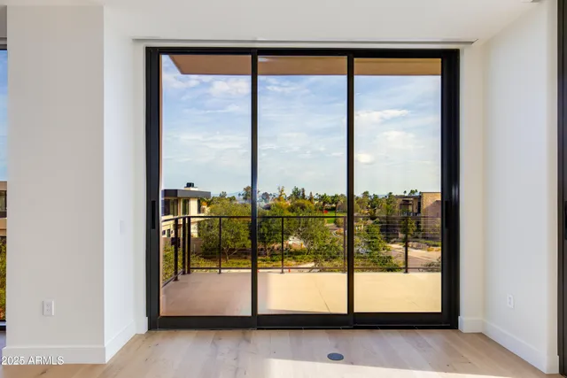 a kitchen with a sink and white cabinets