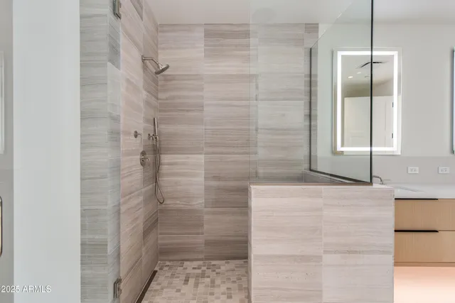 a utility room with sink dryer and washer