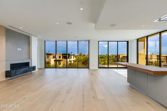a view of an empty room with a sliding door