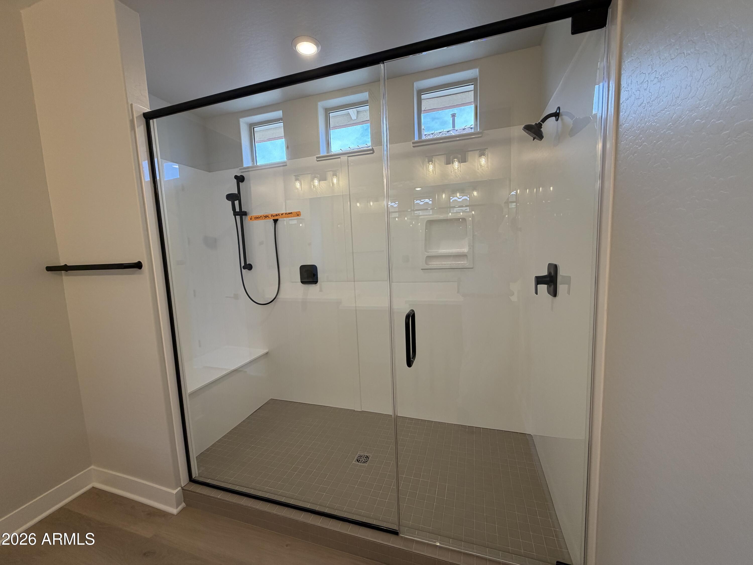 15767 West Sand Hills Road Surprise, AZ 85387 - Photo 16 of 60 a bathroom with a shower