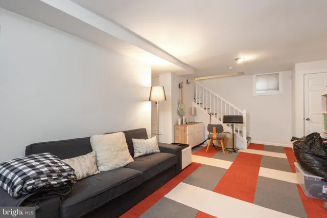 a living room with furniture and a couch