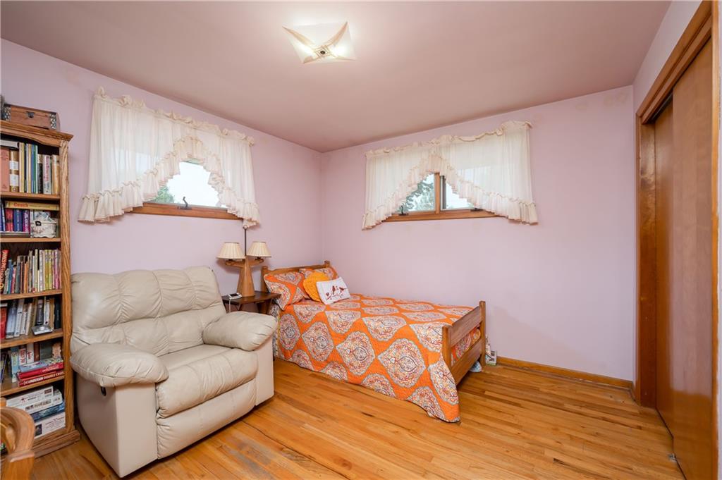 109 Hillcrest Road Renfrew, PA 16053 - Photo 18 of 30 a living room with furniture and a book shelf