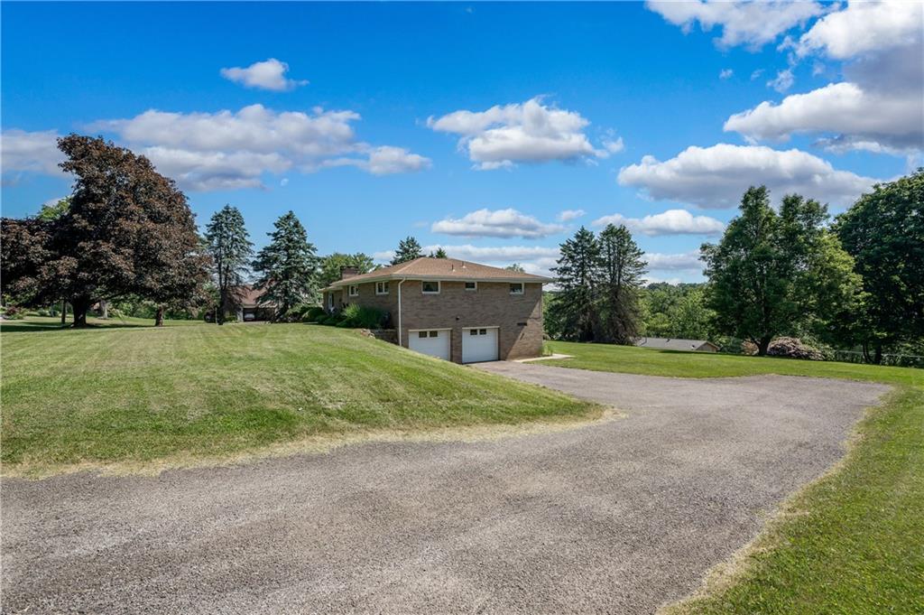 109 Hillcrest Road Renfrew, PA 16053 - Photo 28 of 30 a view of a field with a big yard