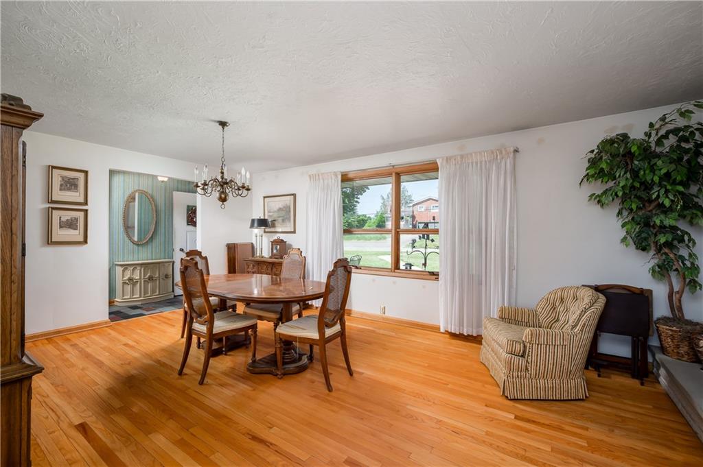 109 Hillcrest Road Renfrew, PA 16053 - Photo 4 of 30 a view of a dining room with furniture window and wooden floor