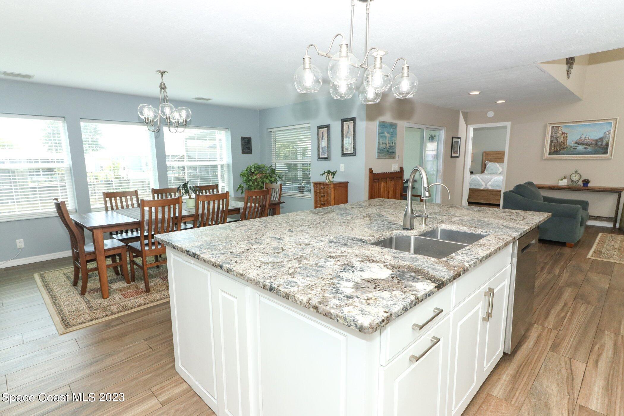 834 Egret Road Cocoa, FL 32926 - Photo 11 of 85 41023997-013-Kitchen_Dining_Alt_View