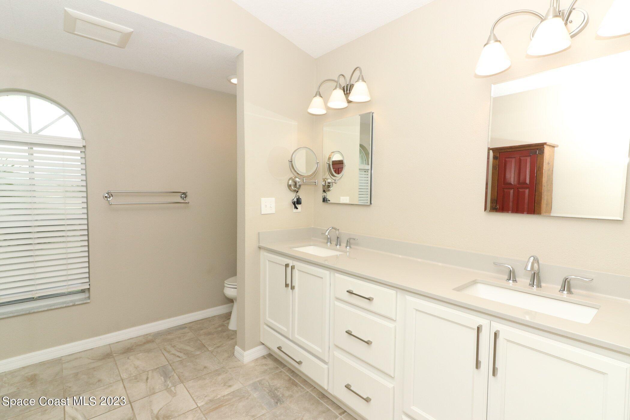 834 Egret Road Cocoa, FL 32926 - Photo 21 of 85 41023997-021-Master_Bathroom_Alt_View