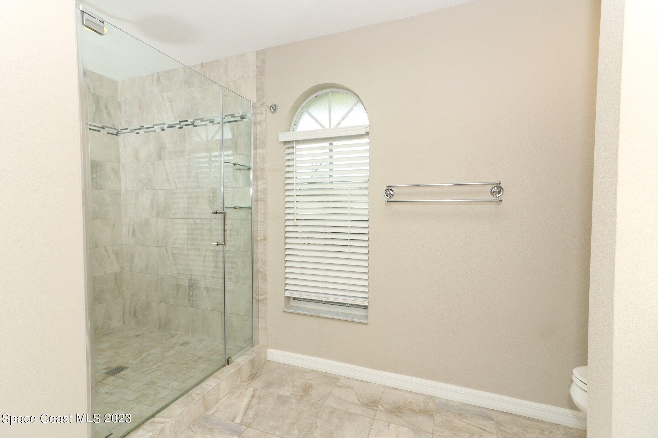 834 Egret Road Cocoa, FL 32926 - Photo 22 of 85 41023997-022-Master_Bathroom_Alt_View