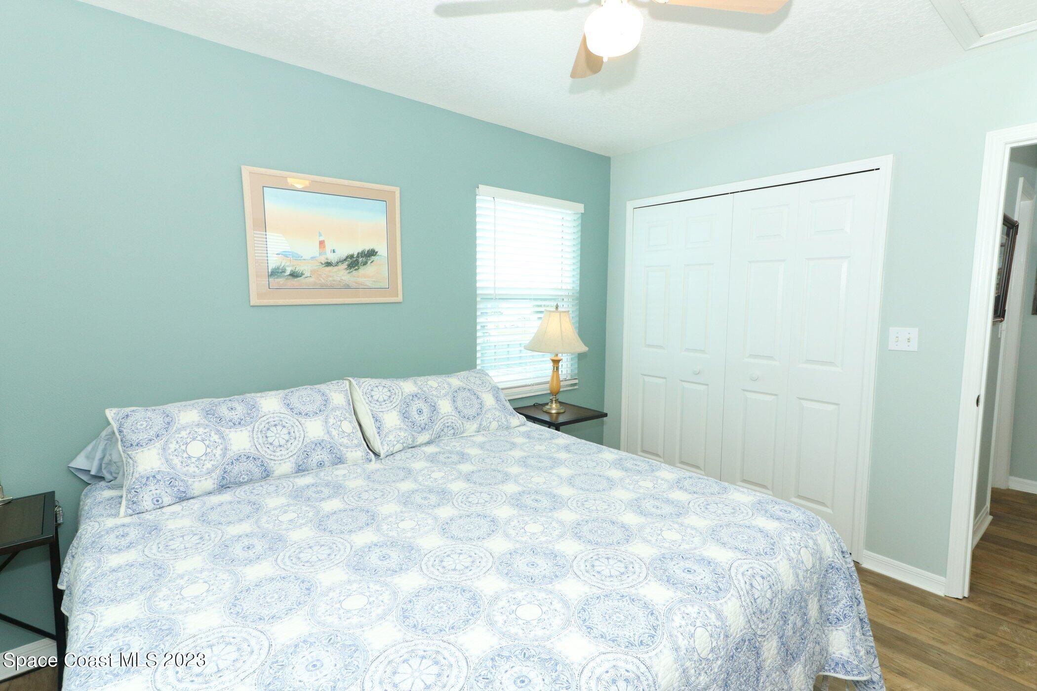 834 Egret Road Cocoa, FL 32926 - Photo 34 of 85 a bedroom with a bed and a window