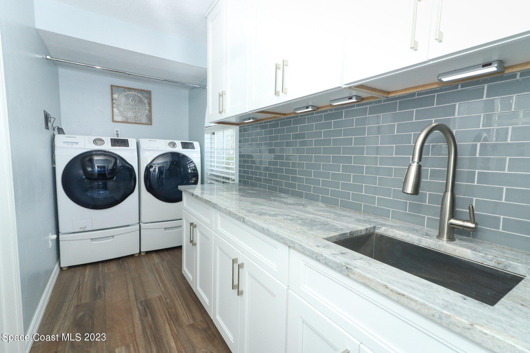 834 Egret Road Cocoa, FL 32926 - Photo 35 of 85 41023997-035-Laundry_Room
