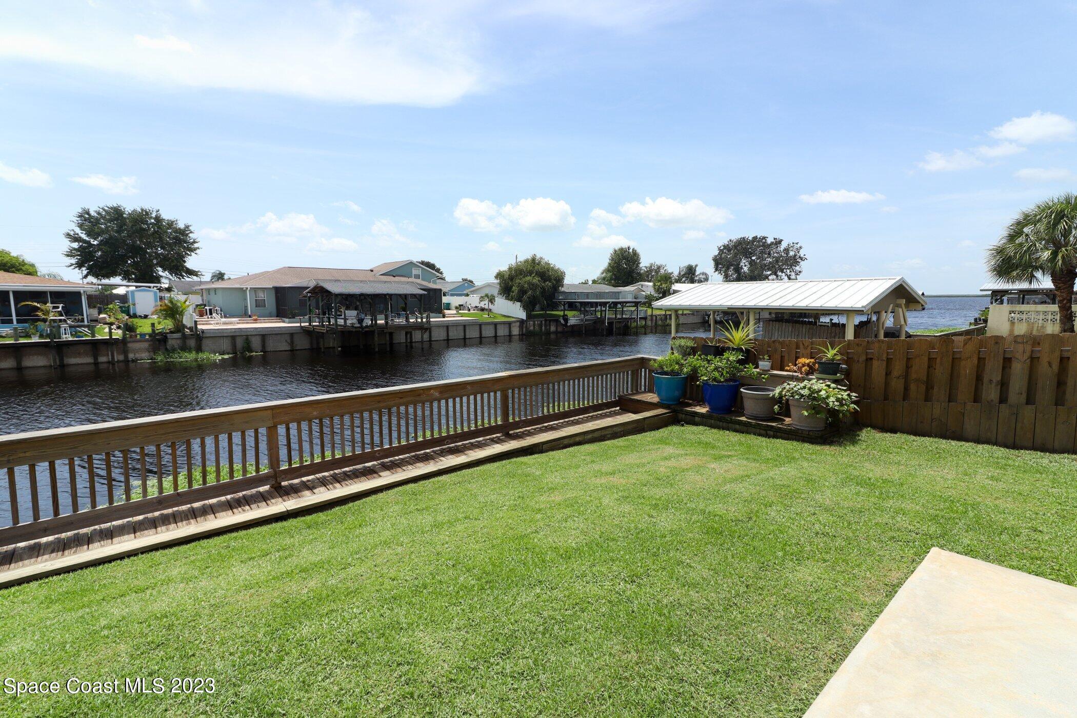 834 Egret Road Cocoa, FL 32926 - Photo 45 of 85 41023997-045-Back_Canal_View