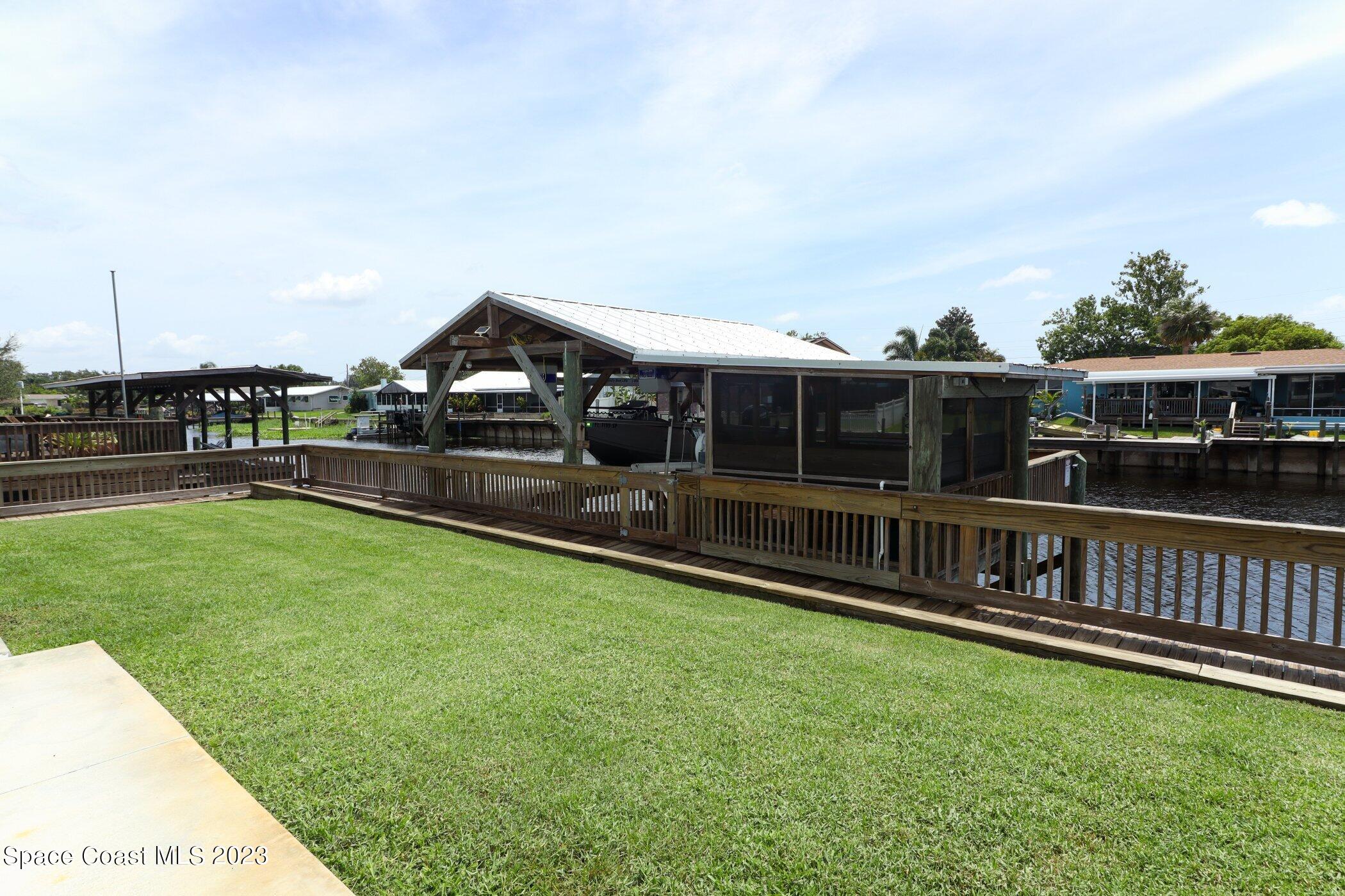 834 Egret Road Cocoa, FL 32926 - Photo 46 of 85 41023997-046-Back_Dock_View