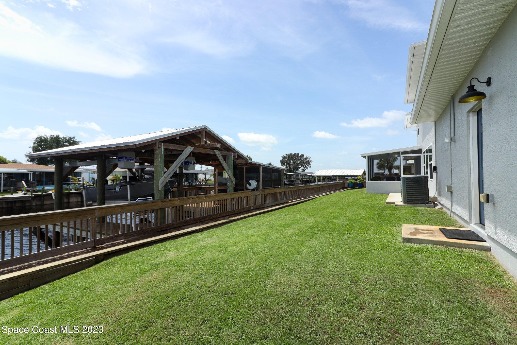 834 Egret Road Cocoa, FL 32926 - Photo 47 of 85 41023997-047-Back_Dock_Alt_View