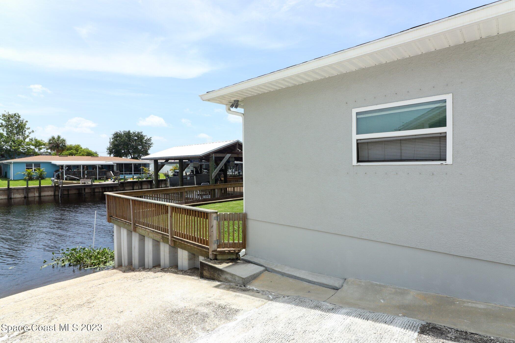 834 Egret Road Cocoa, FL 32926 - Photo 55 of 85 a view of a house with a backyard