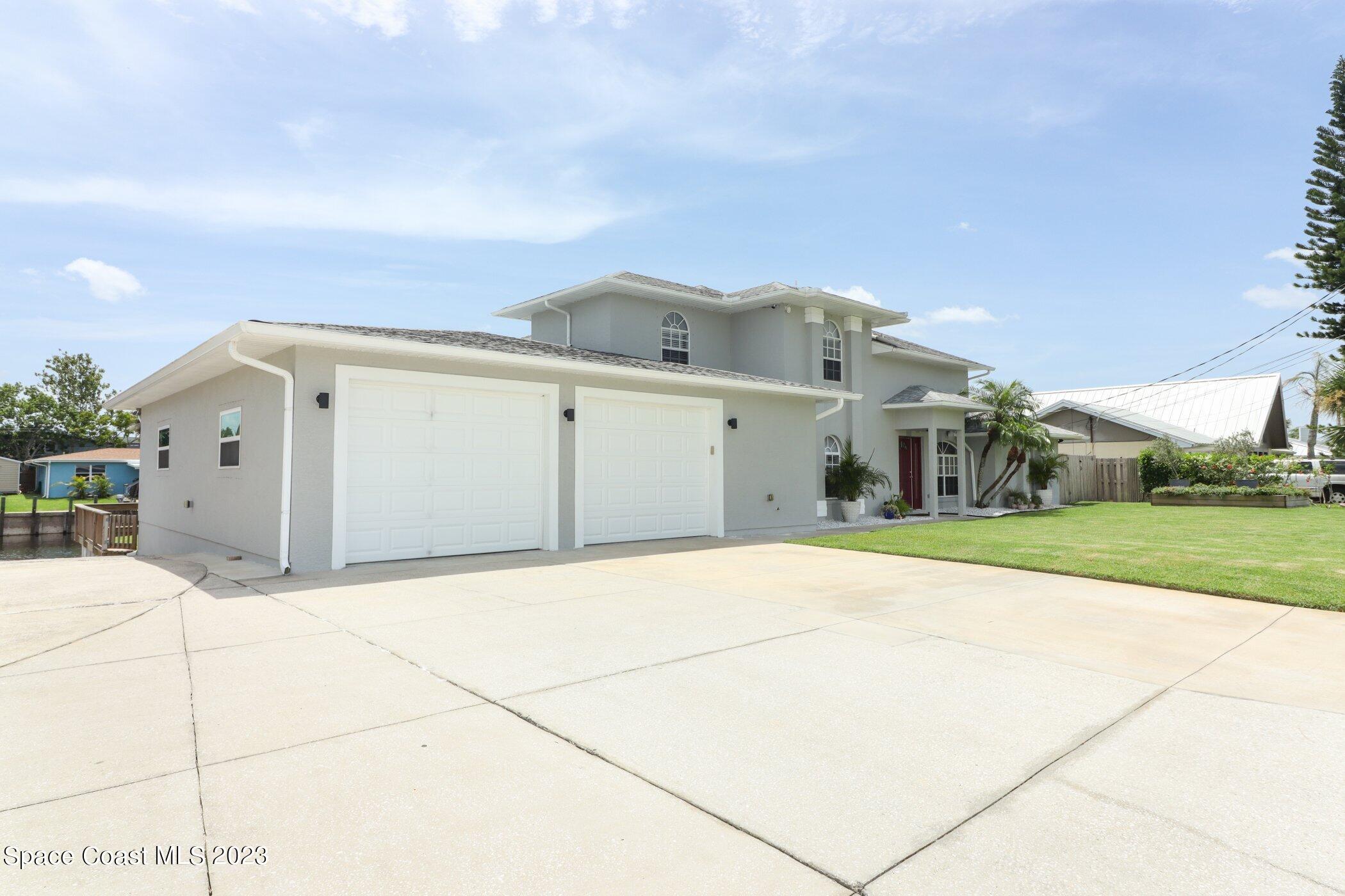 834 Egret Road Cocoa, FL 32926 - Photo 56 of 85 41023997-056-Front_Alt_View