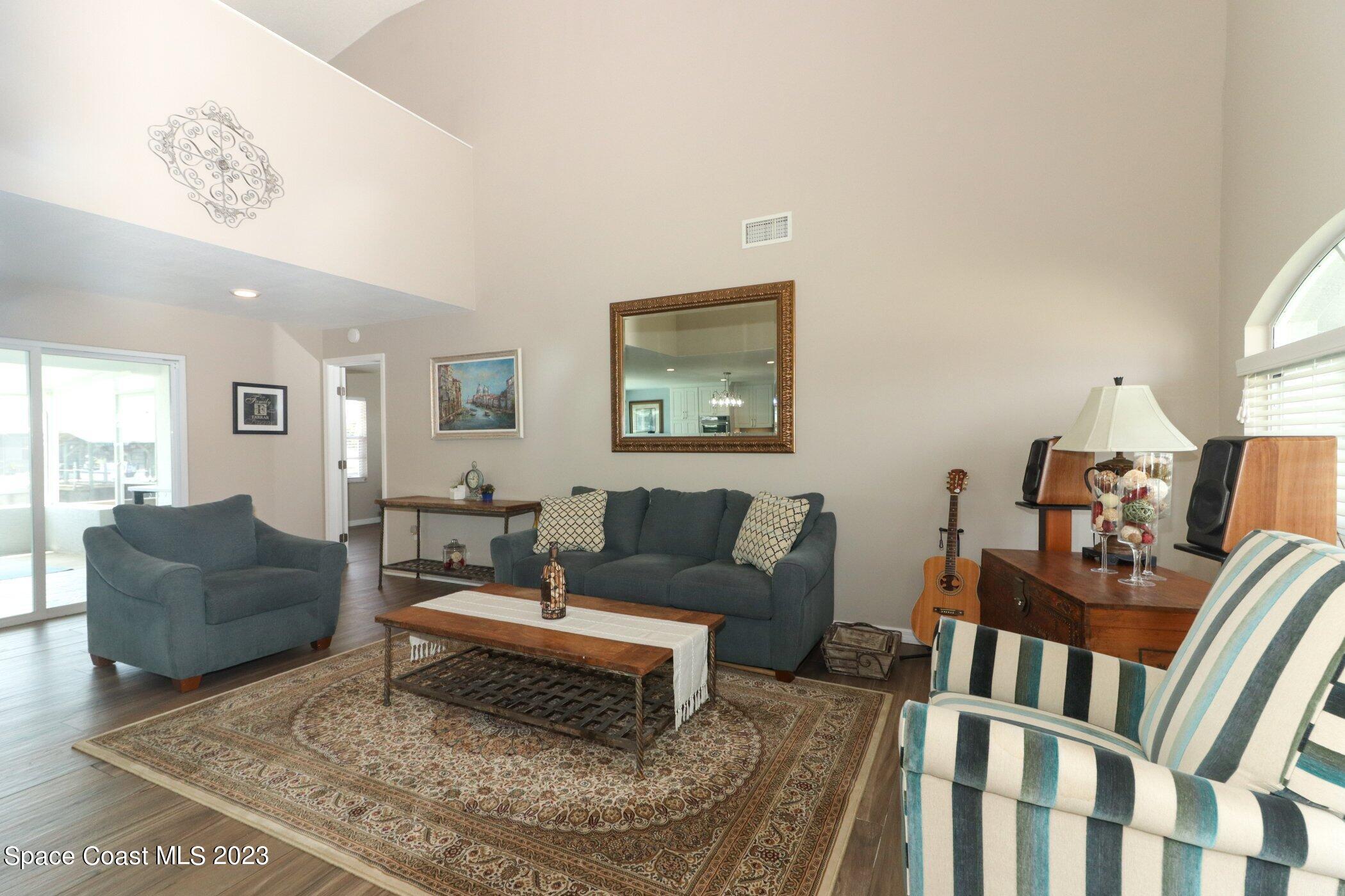 834 Egret Road Cocoa, FL 32926 - Photo 6 of 85 a living room with furniture and a rug