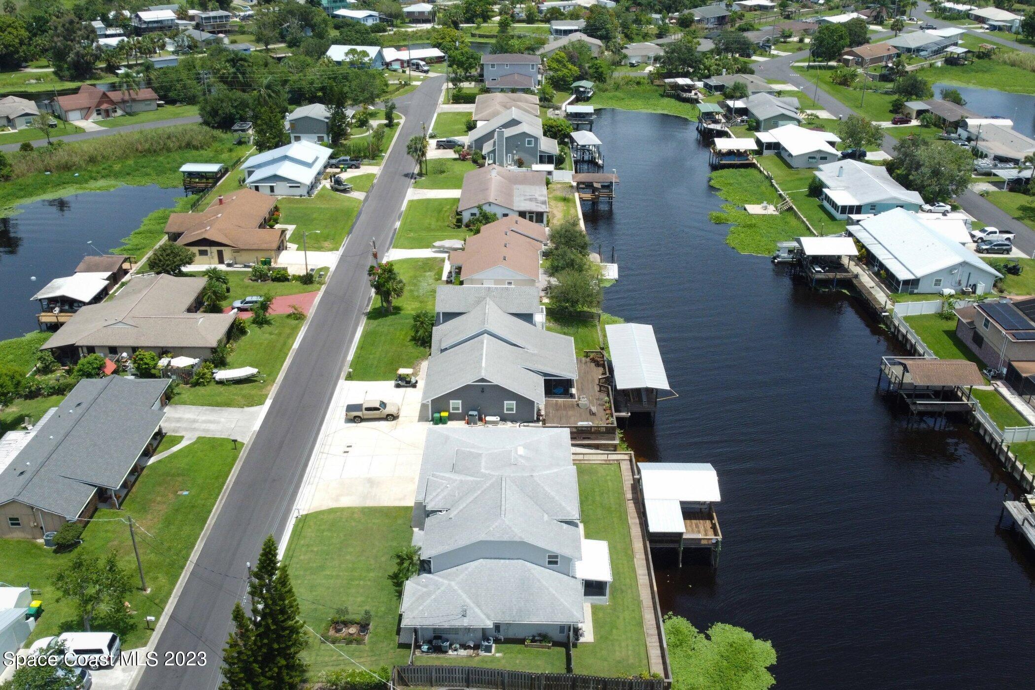 834 Egret Road Cocoa, FL 32926 - Photo 73 of 85 an aerial view of houses with yard