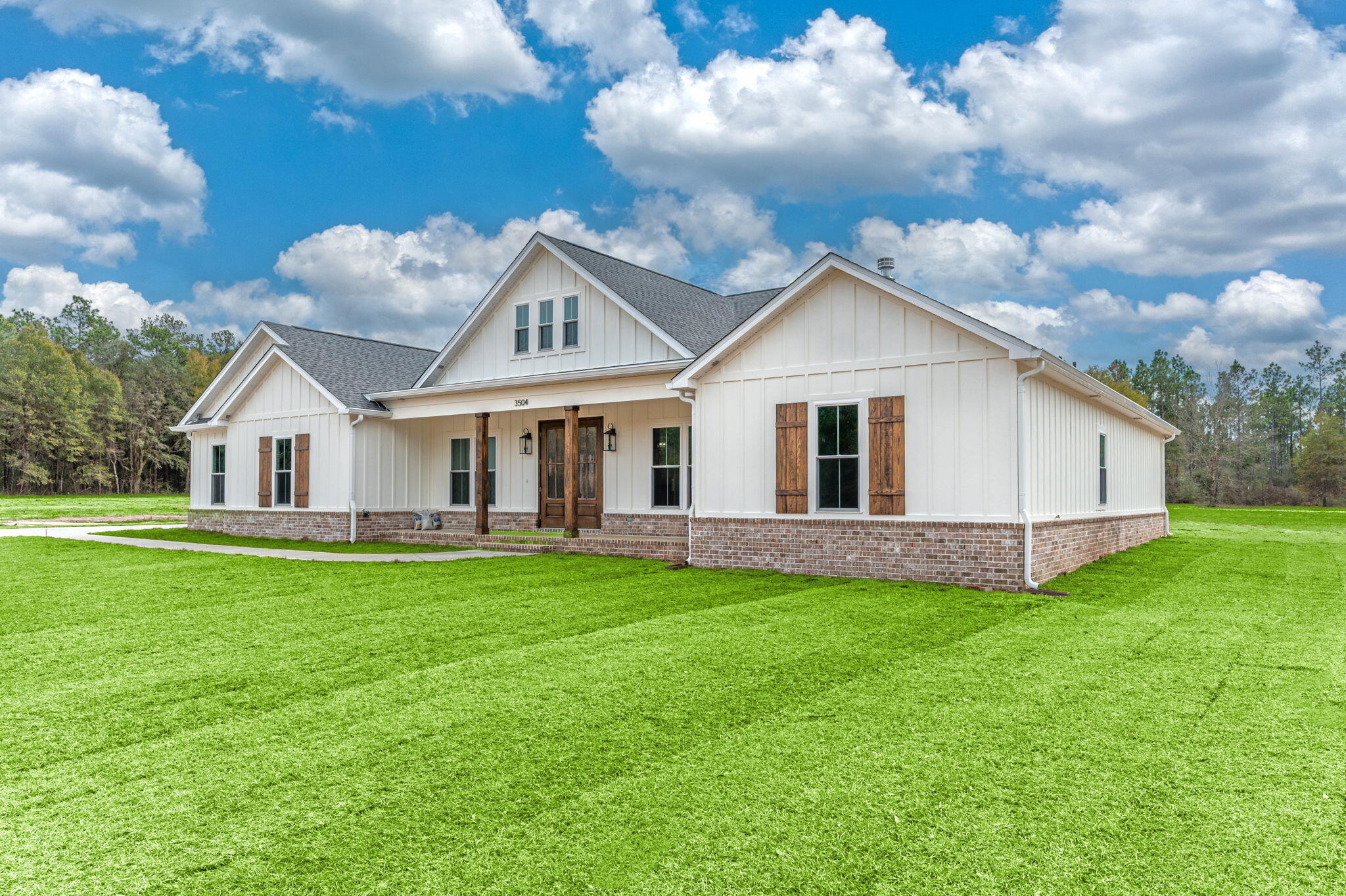 3504 Plympton Road Laurel Hill, FL 32567 - Photo 2 of 62 a view of a house with a yard and front view of a house