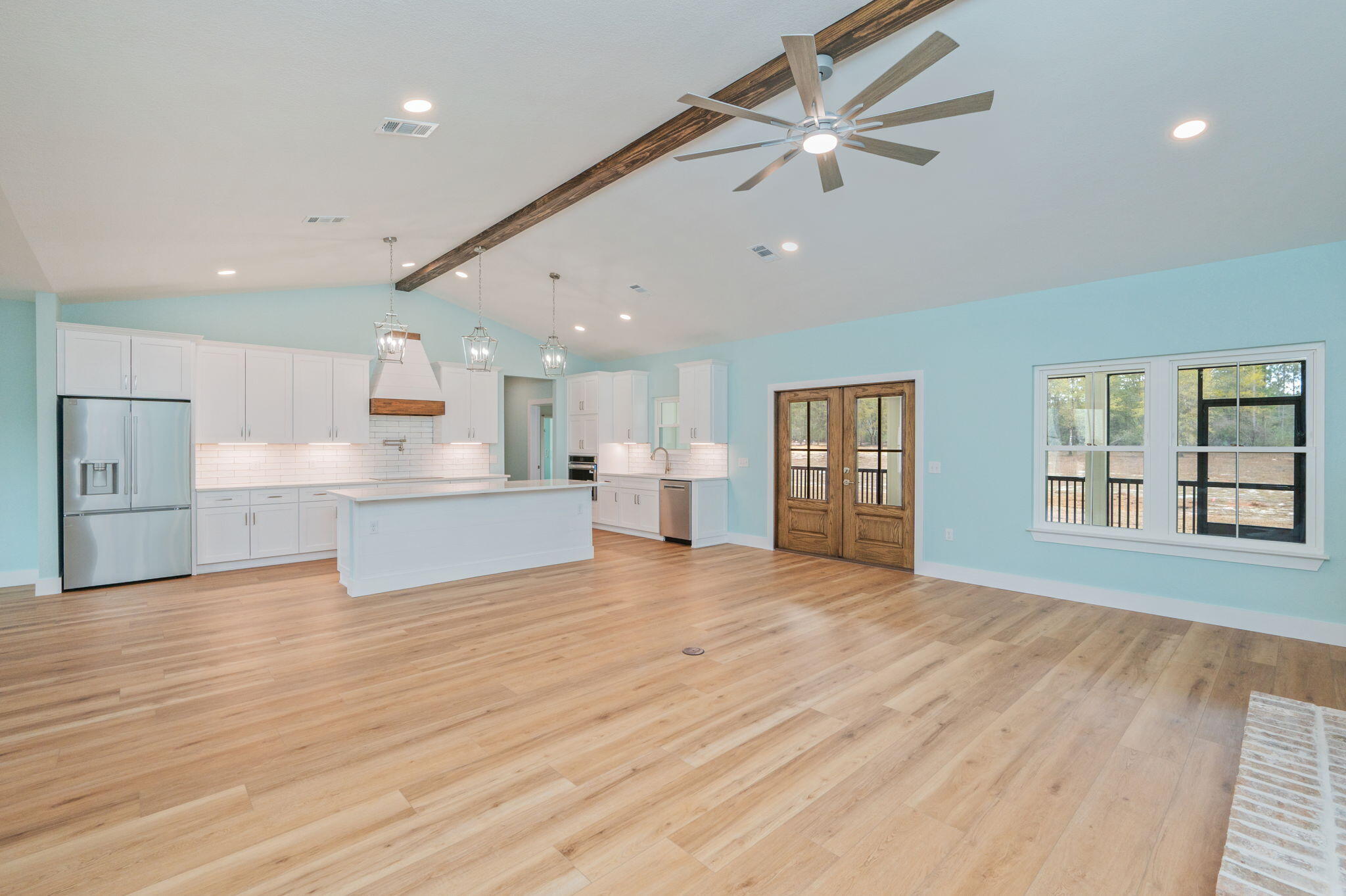 3504 Plympton Road Laurel Hill, FL 32567 - Photo 24 of 62 a view of an empty room with a kitchen and a window