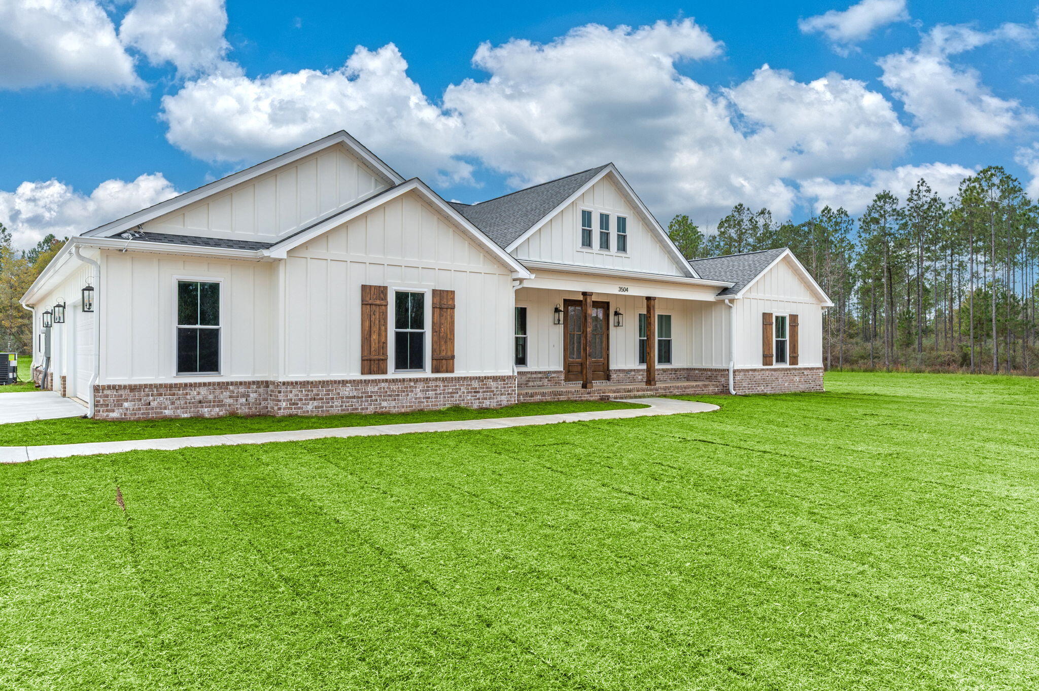 3504 Plympton Road Laurel Hill, FL 32567 - Photo 3 of 62 a view of a house with a yard