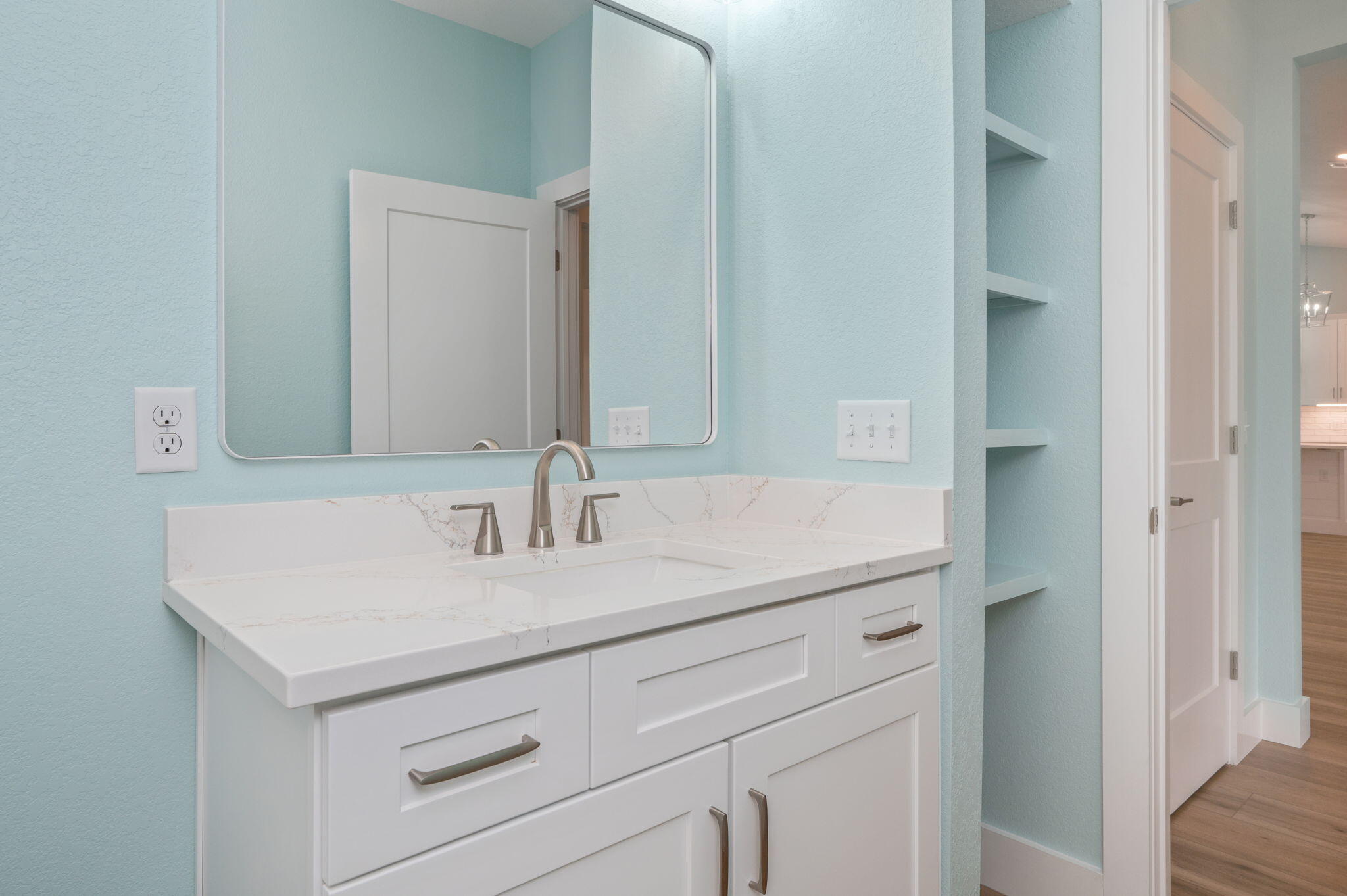 3504 Plympton Road Laurel Hill, FL 32567 - Photo 31 of 62 a bathroom with a sink and a mirror