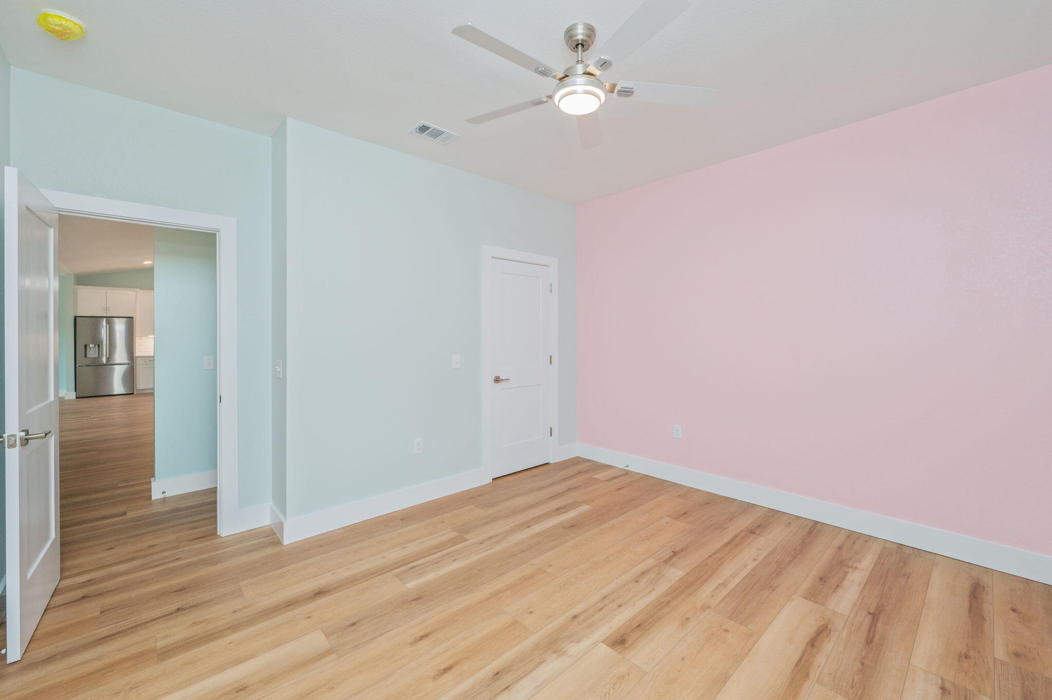 3504 Plympton Road Laurel Hill, FL 32567 - Photo 33 of 62 a view of empty room with wooden floor