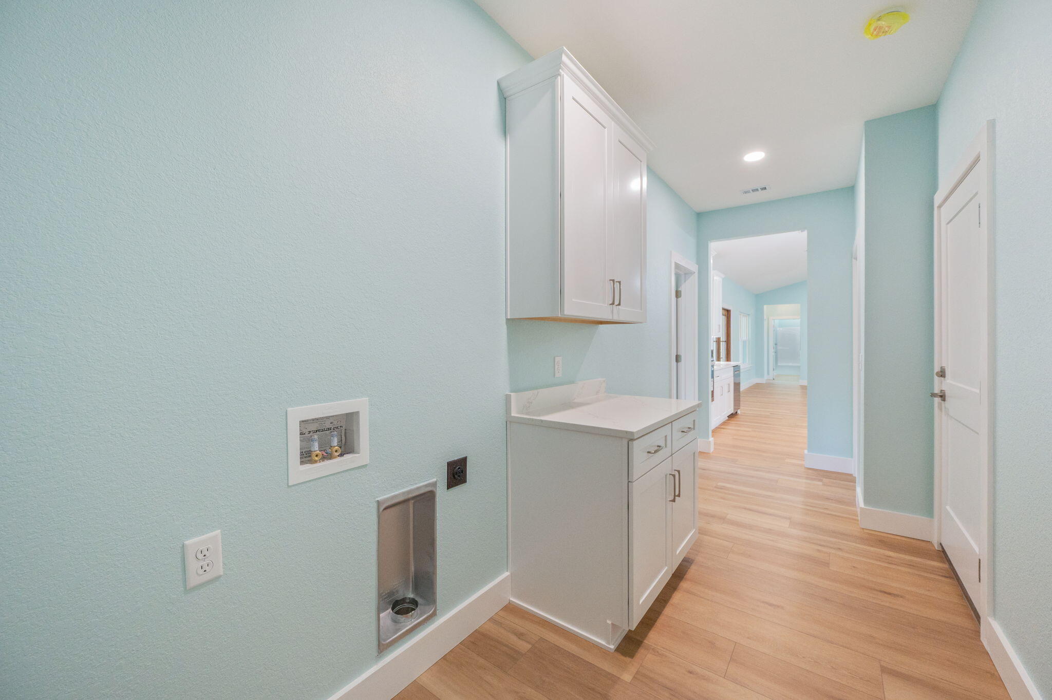 3504 Plympton Road Laurel Hill, FL 32567 - Photo 51 of 62 a view of a kitchen with white cabinets