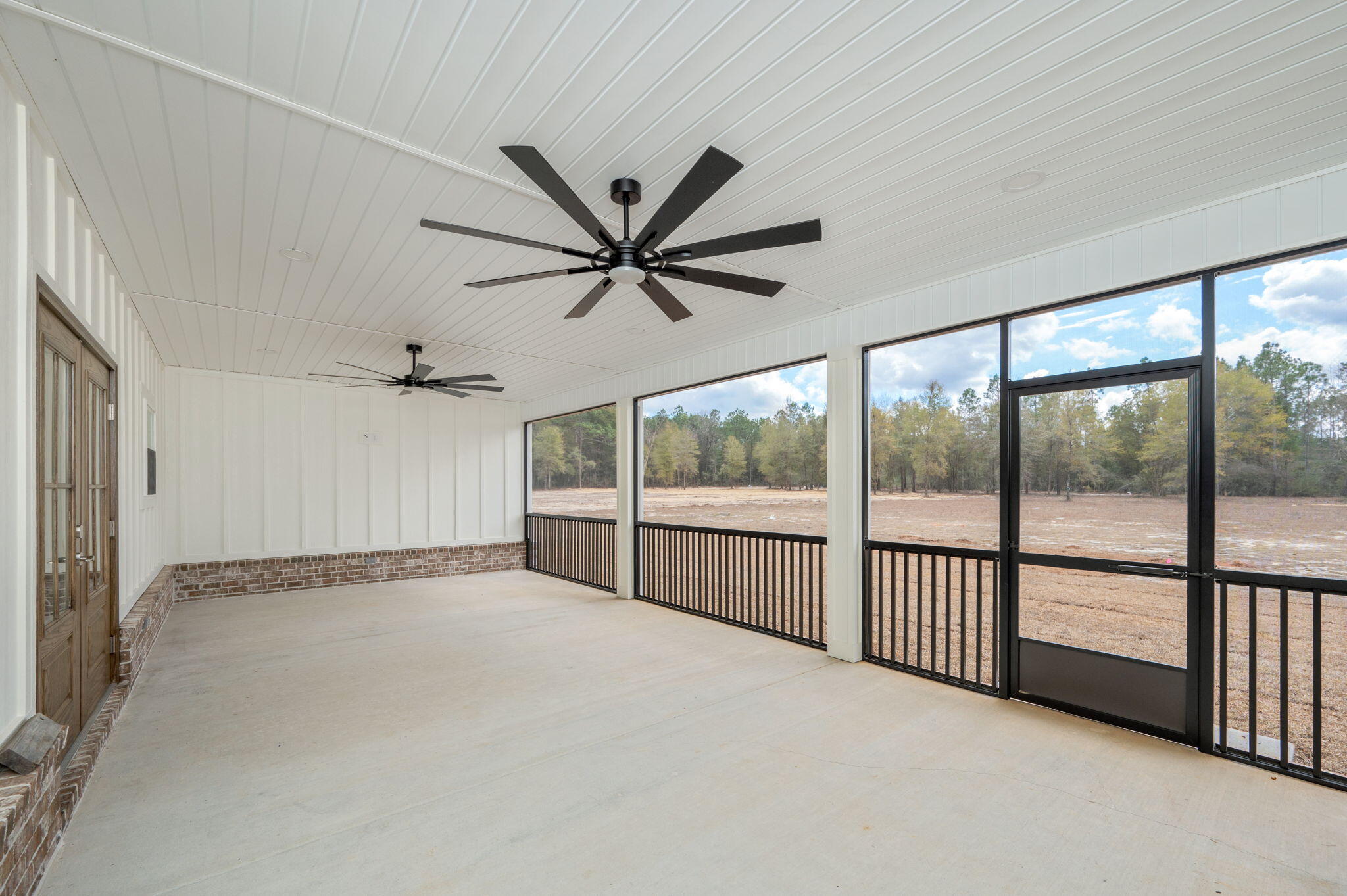 3504 Plympton Road Laurel Hill, FL 32567 - Photo 52 of 62 a view of a livingroom with a ceiling fan and window