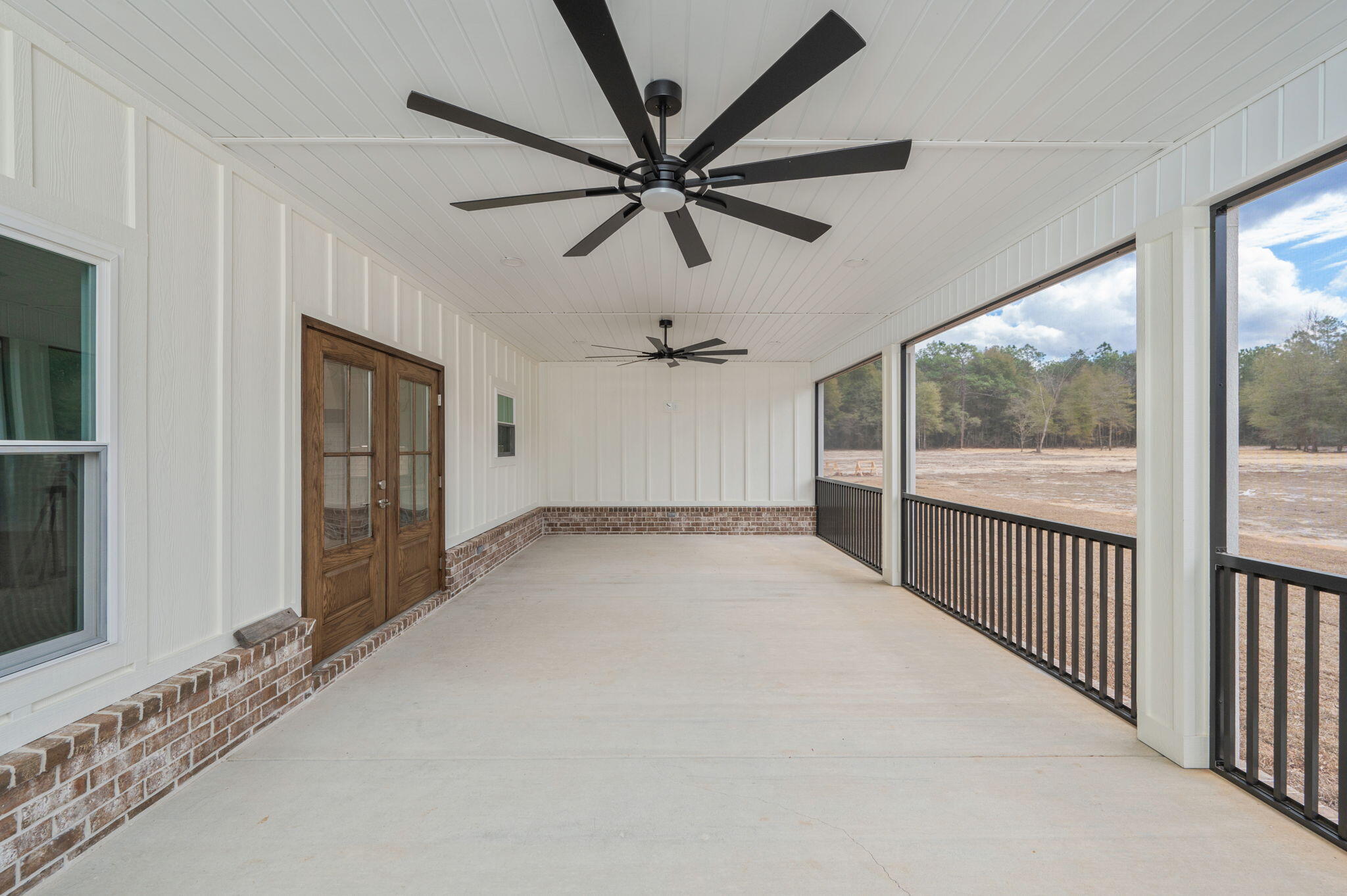 3504 Plympton Road Laurel Hill, FL 32567 - Photo 53 of 62 a view of a hallway with a ceiling fan