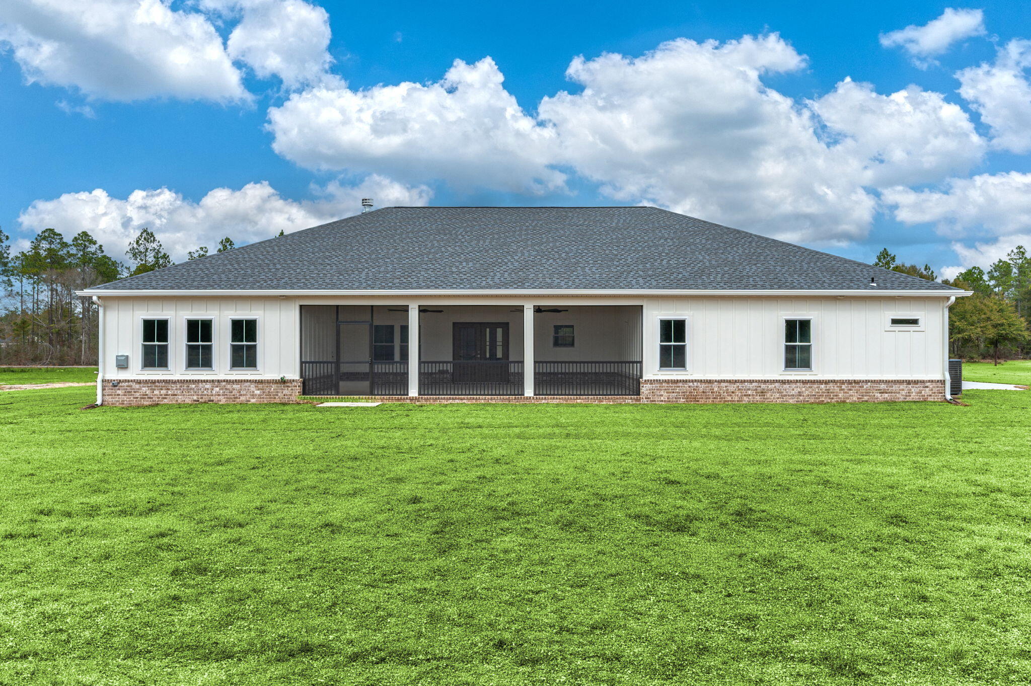 3504 Plympton Road Laurel Hill, FL 32567 - Photo 55 of 62 front view of a house with a garden