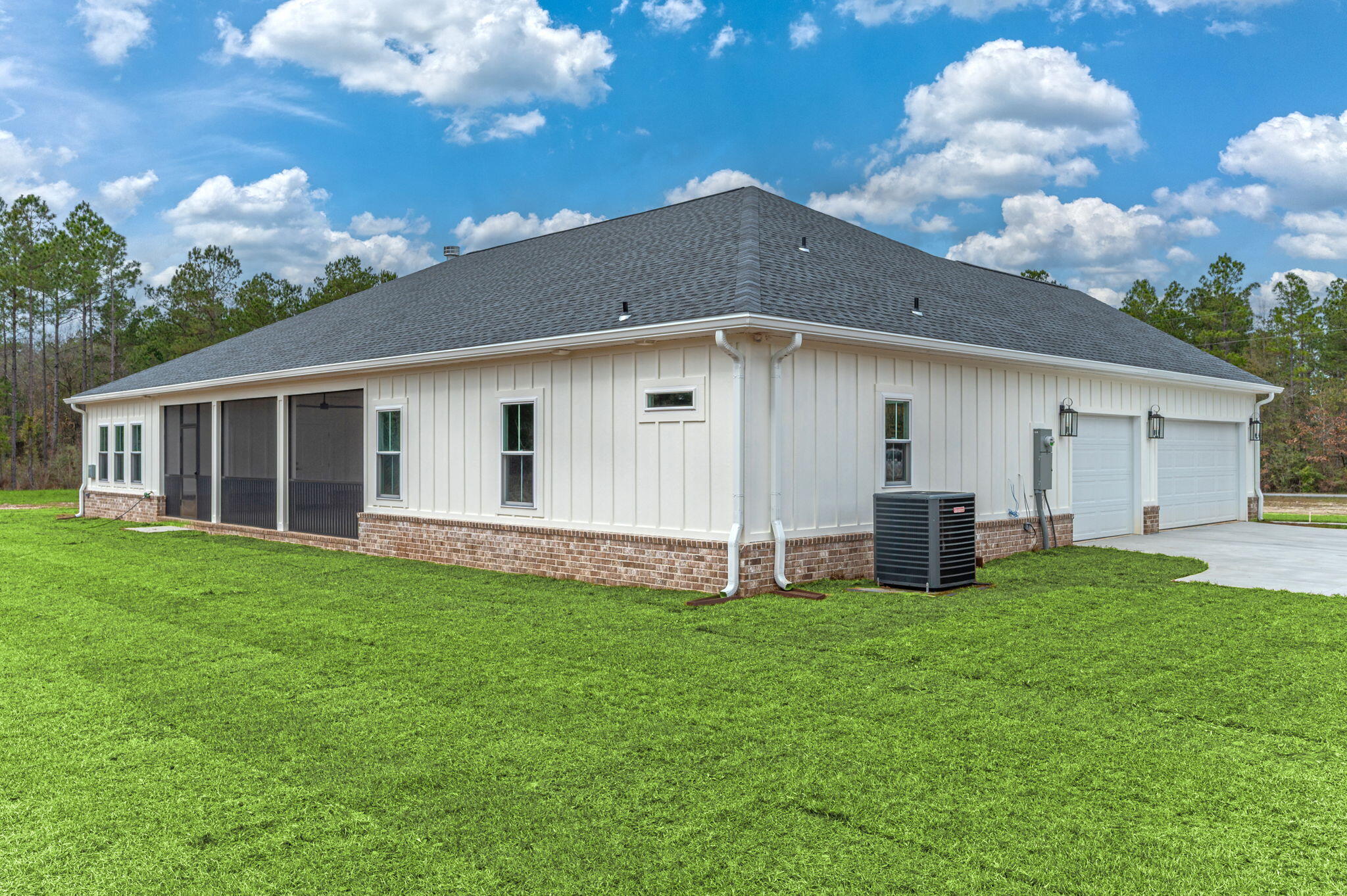 3504 Plympton Road Laurel Hill, FL 32567 - Photo 56 of 62 a view of a house with a yard and porch