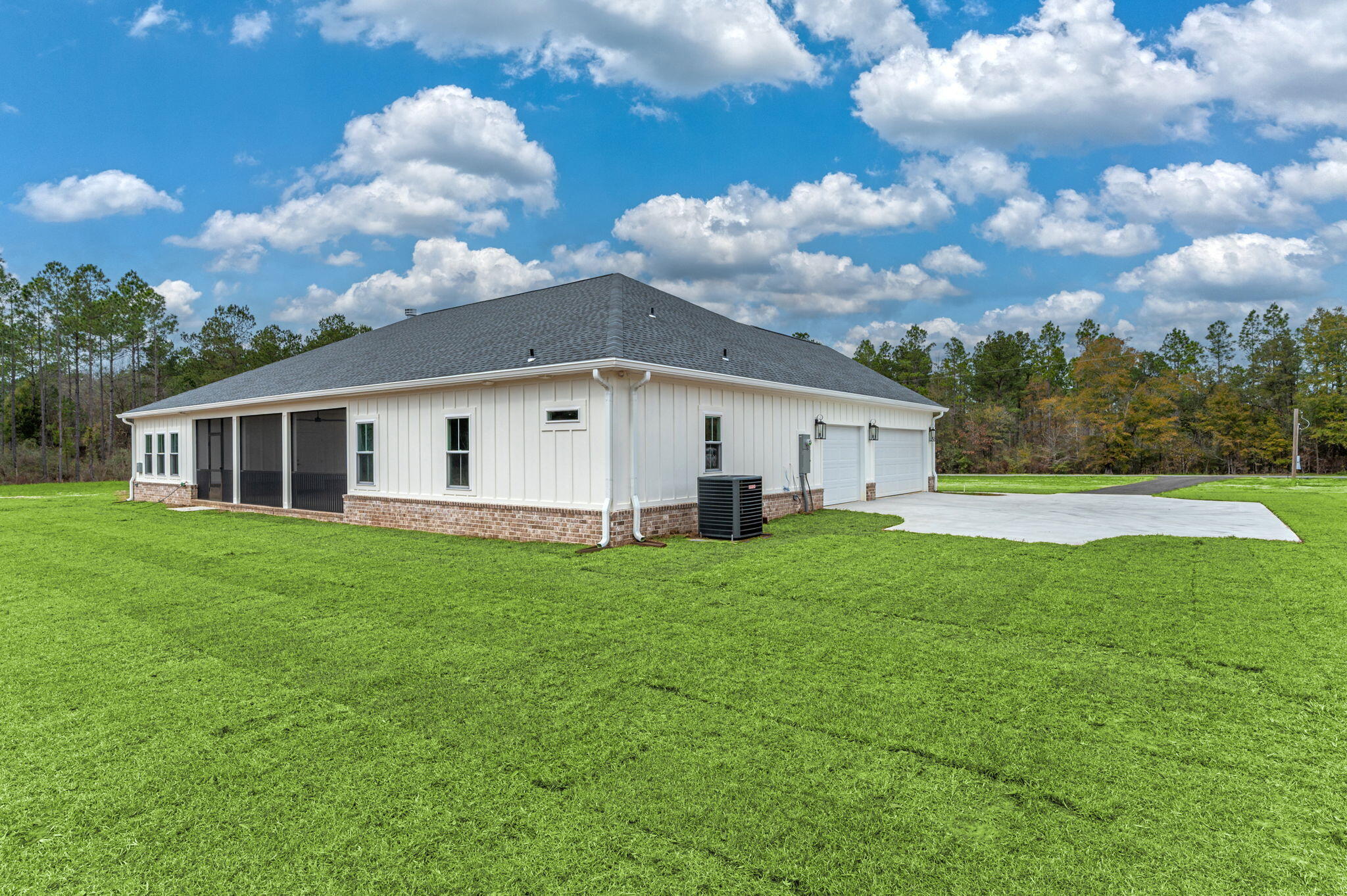 3504 Plympton Road Laurel Hill, FL 32567 - Photo 57 of 62 a view of a house with backyard and garden