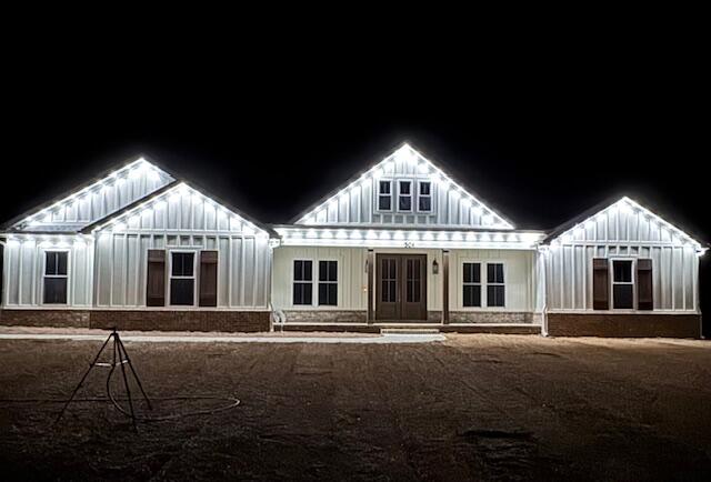 3504 Plympton Road Laurel Hill, FL 32567 - Photo 62 of 62 a front view of a house with a yard