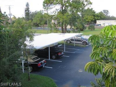 3806 Guilford Road, Unit 101 Naples, FL 34112 - Photo 15 of 19 a view of a lake with outdoor space