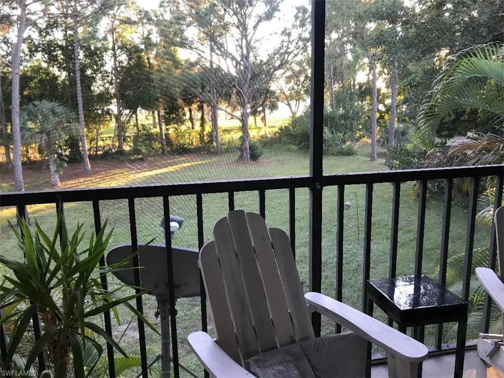 3806 Guilford Road, Unit 101 Naples, FL 34112 - Photo 3 of 19 a view of a chairs and table in patio