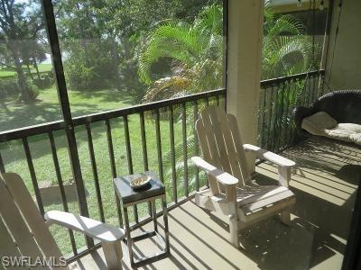 3806 Guilford Road, Unit 101 Naples, FL 34112 - Photo 4 of 19 a view of balcony with wooden floor and outdoor seating