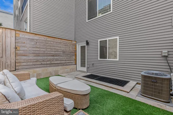 a view of a back yard with a chair
