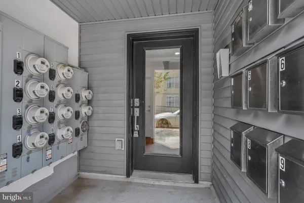 a bathroom with a shower and a sink