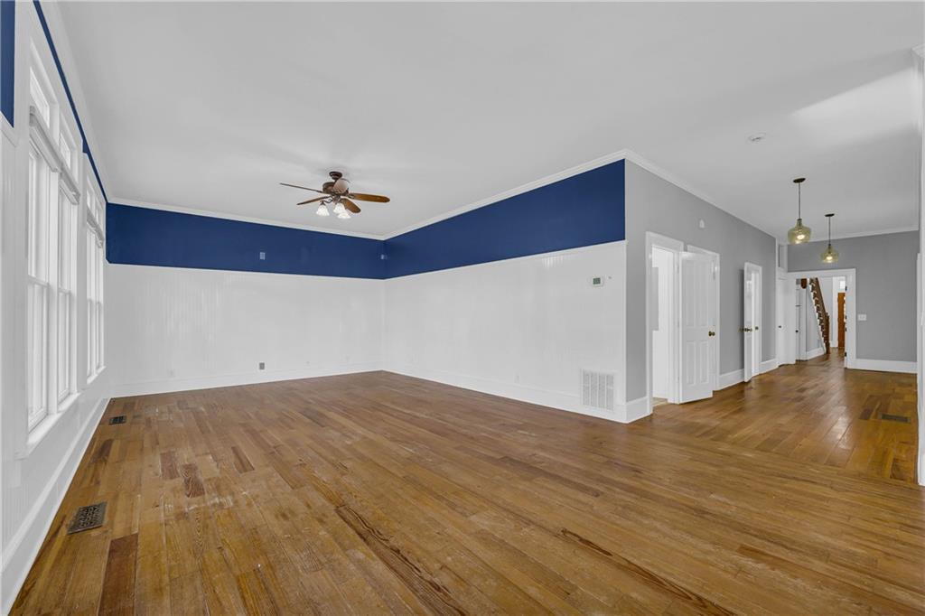 5921 Bostwick Road Bishop, GA 30621 - Photo 26 of 65 a view of empty room with wooden floor