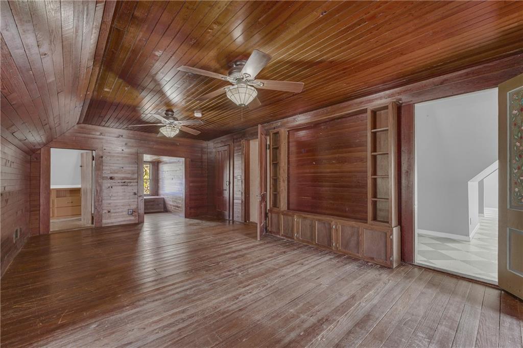 5921 Bostwick Road Bishop, GA 30621 - Photo 39 of 65 a view of empty room with wooden floor