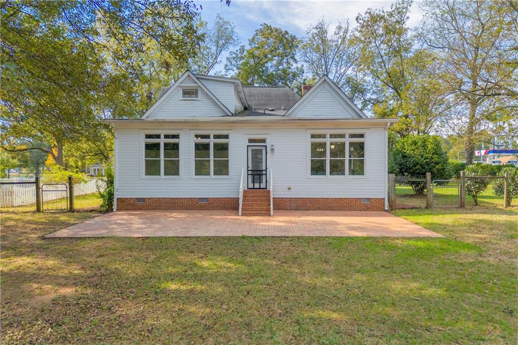5921 Bostwick Road Bishop, GA 30621 - Photo 50 of 65 front view of a house with a yard