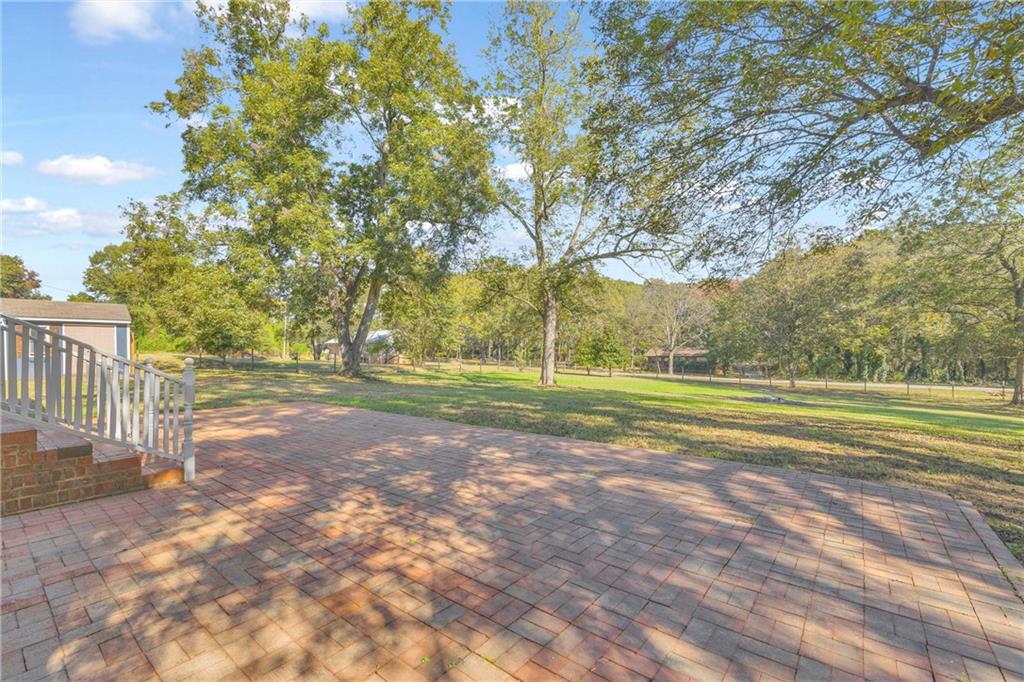 5921 Bostwick Road Bishop, GA 30621 - Photo 52 of 65 a view of a house with a big yard