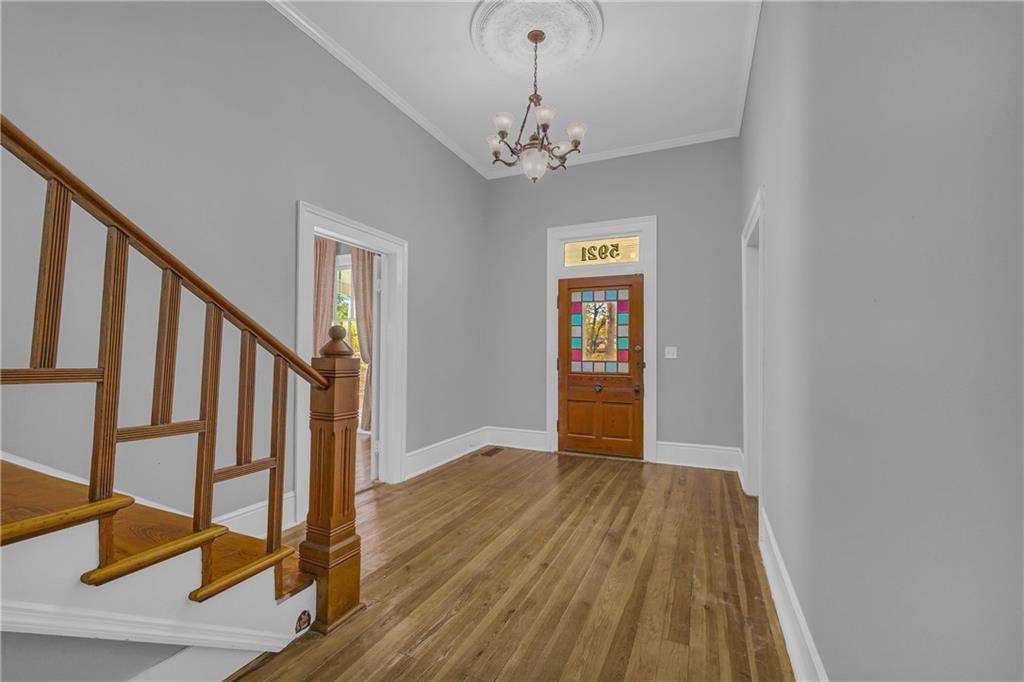 5921 Bostwick Road Bishop, GA 30621 - Photo 6 of 65 a view of an entryway with wooden floor